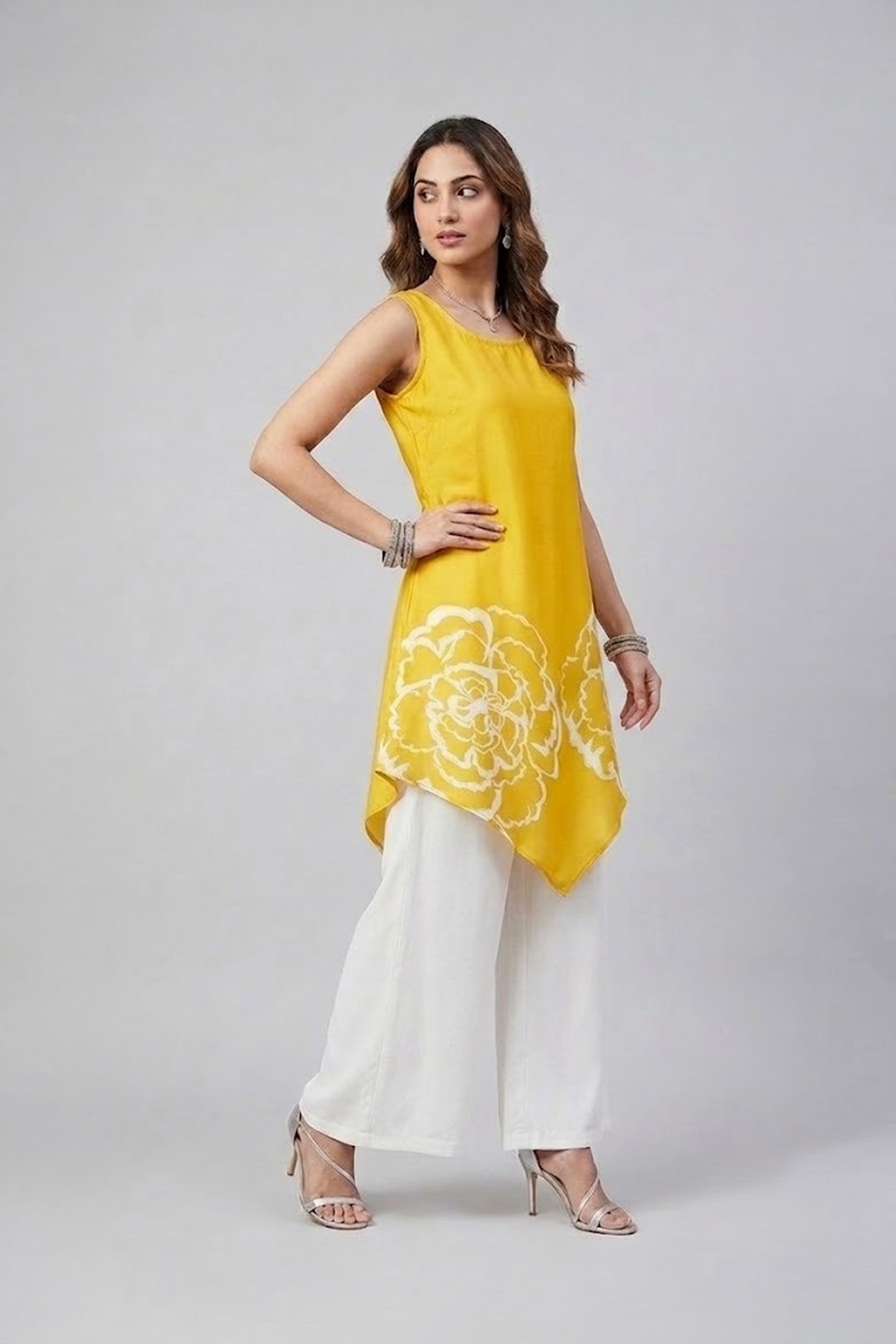Yellow floral asymmetric tunic set with white wide-leg pants