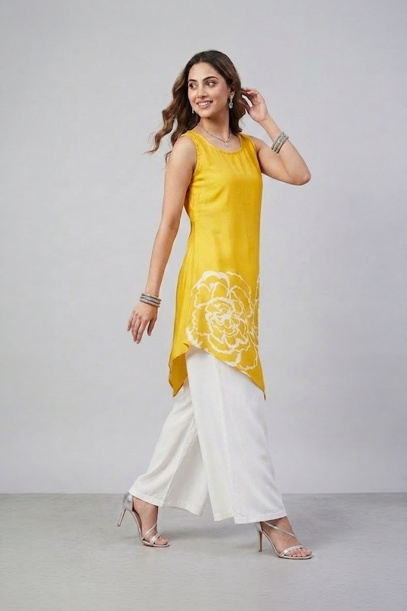 Yellow floral asymmetric tunic set with white wide-leg pants