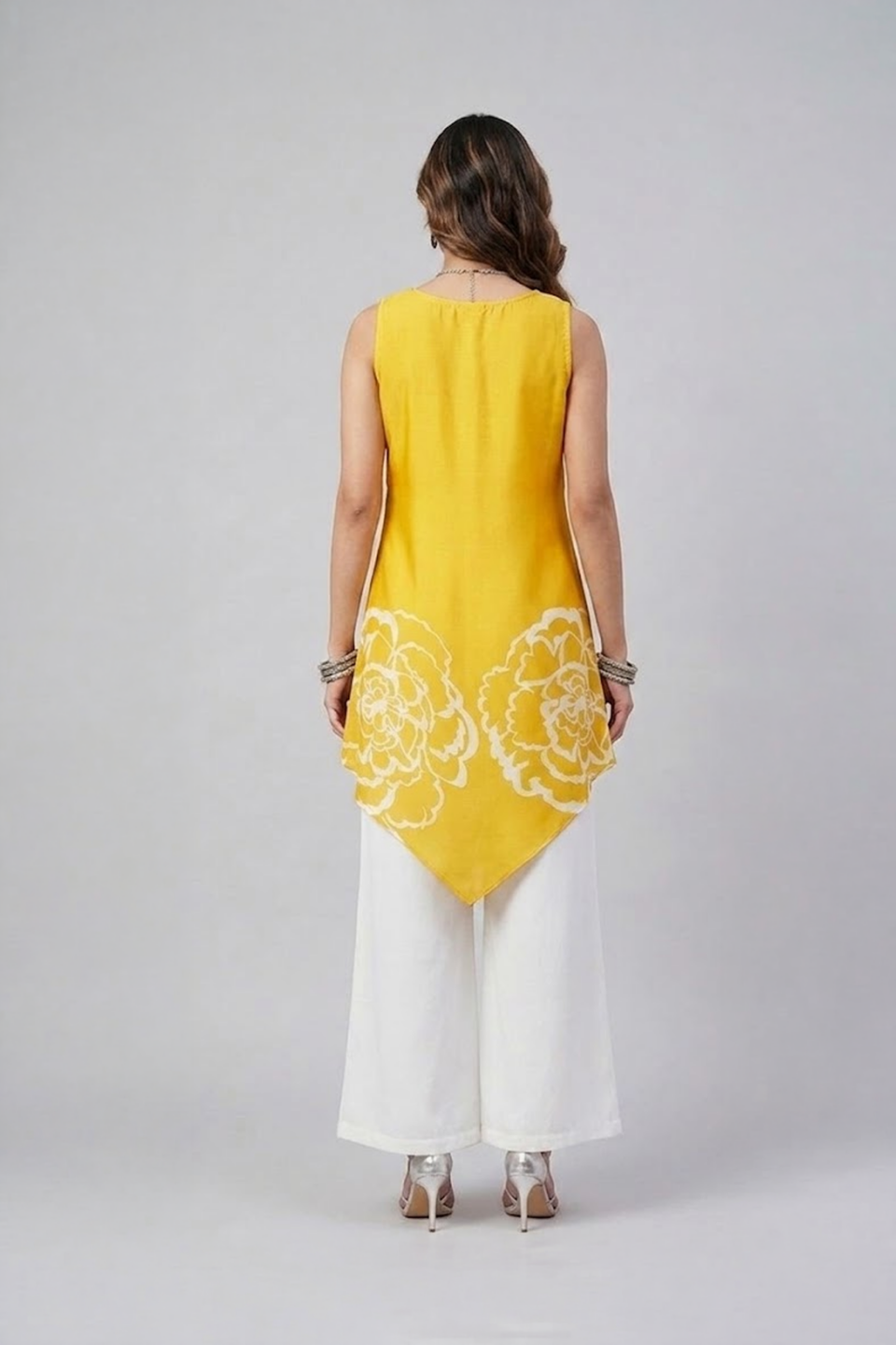 Yellow floral asymmetric tunic set with white wide-leg pants
