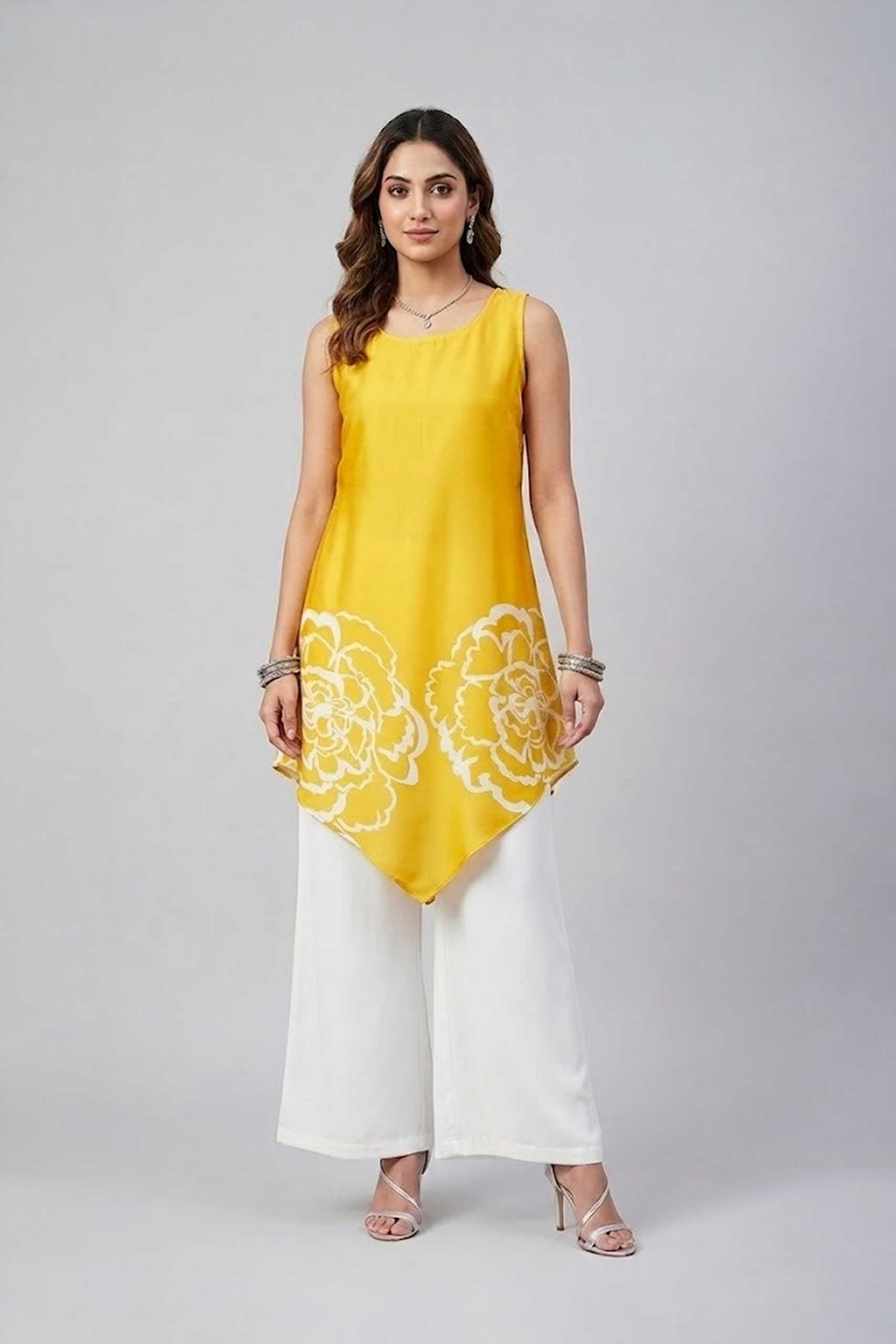 Yellow floral asymmetric tunic set with white wide-leg pants