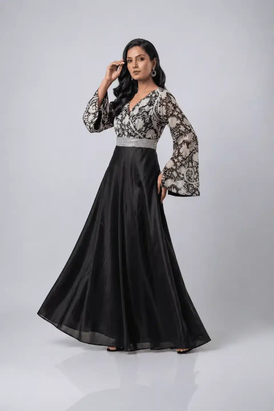 Black Kimono Sleeve Gown with floral wrap bodice and heel-length black skirt, alternate three-quarter pose