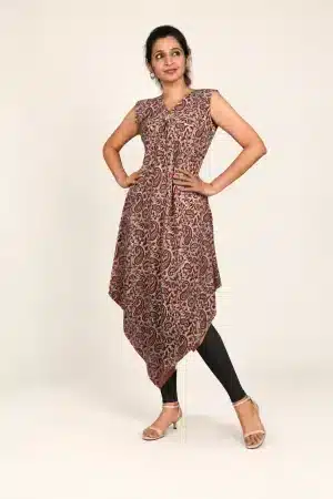 Maroon paisley Ajrakh hand-block print tunic, hands-on-waist pose styled with black leggings