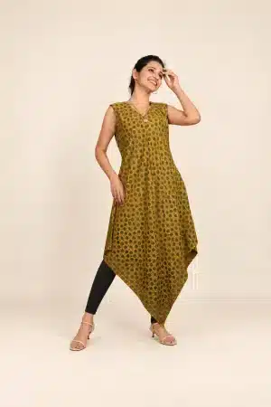Mustard Ajrakh hand-block print tunic, relaxed front pose styled with black leggings