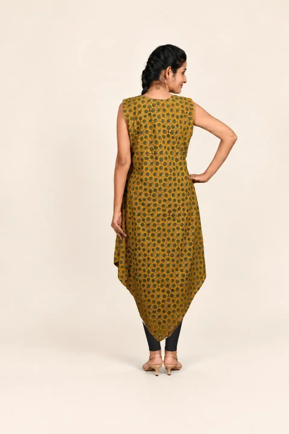 Mustard Ajrakh hand-block print tunic, back view styled with black leggings