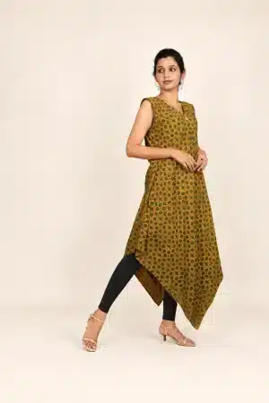Mustard Ajrakh hand-block print tunic, three-quarter view styled with black leggings