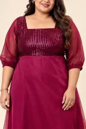 Close-up of the Maroon Sequin Elegance Gown showing the sequinned bodice, square neckline and sheer puff sleeves