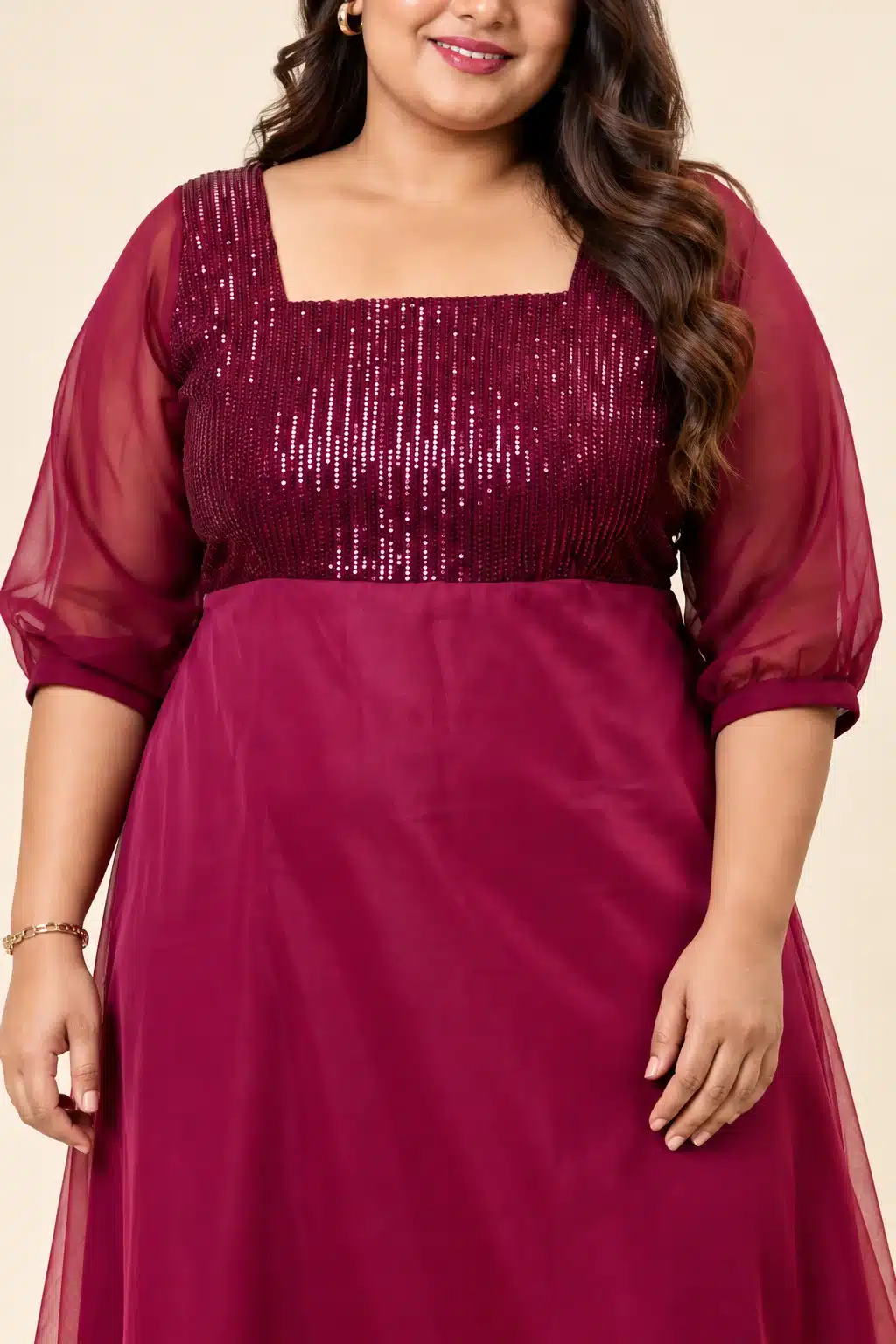 Close-up of the Maroon Sequin Elegance Gown showing the sequinned bodice, square neckline and sheer puff sleeves
