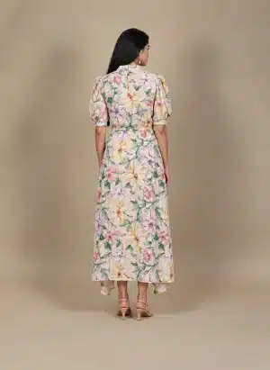 Pastel Floral High Low Dress in beige with multicolour flowers, back view showing the floral print and hem.